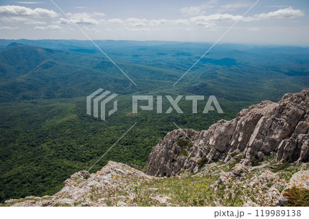 Beautiful landscape on the rocks and forest from the top of the mountain Beautiful landscape on the rocks and forest from the top of the mountain 119989138