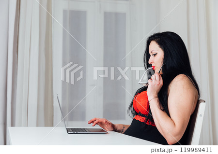 Beautiful Woman Works Studying Online With Laptop 119989411