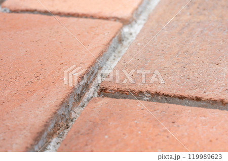 Close up to foam brick board, the element for cover and install with polyurethane glue on the wall Close up to foam brick board, the element for cover and install with polyurethane glue on the wall 119989623