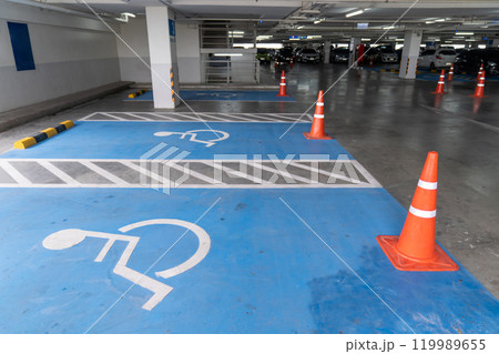 The handicap lot of car parking indoor at department store. 119989655