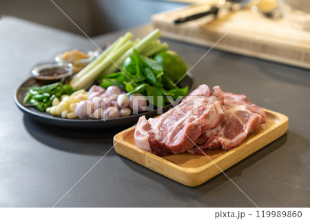 Close up to packshot of Raw Pork and herb ingredients, preparation for Cooking in Thai food menu. Close up to packshot of Raw Pork and herb ingredients, preparation for Cooking in Thai food menu. 119989860