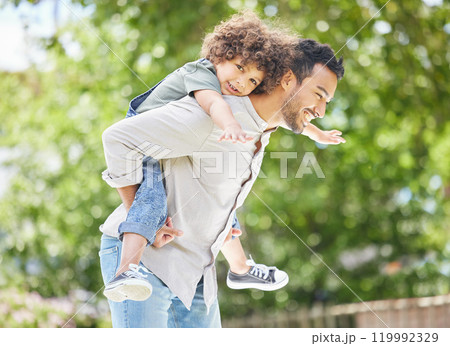 Back ride, portrait and child outdoor with father for happiness, summer or holiday as family. Man, son and smile by tree in backyard with hug for freedom, love or fun together as flying airplane 119992329
