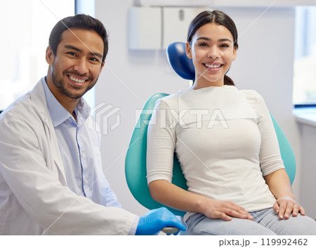 Portrait, dentist and patient in clinic for consultation, oral hygiene or medical procedure. Service, examination and doctor man with happy client for teeth whitening, orthodontics or dental care Portrait, dentist and patient in clinic for consultation, oral hygiene or medical procedure. Service, examination and doctor man with happy client for teeth whitening, orthodontics or dental care 119992462