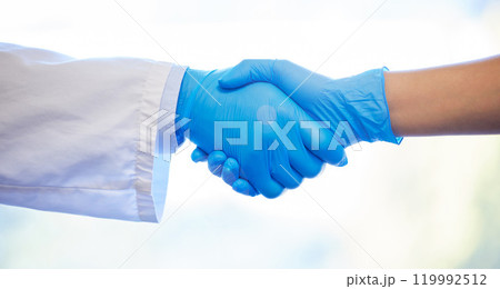 Doctor, gloves and handshake for deal in healthcare, welcome greeting and introduction for partnership. People, shaking hands and agreement for collaboration or medical support, unity and teamwork. 119992512