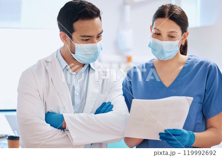 Paper, dentist team and reading in clinic for orthodontics, collaboration and support. People, medical report and together for dental care or oral hygiene, healthcare and talking on surgery 119992692