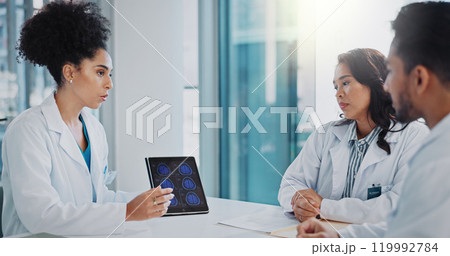 Healthcare, surgeon on tablet and doctor with group in discussion, report and talking about test results in clinic. Neurologist, hospital and medical worker, consultation for brain and MRI scan Healthcare, surgeon on tablet and doctor with group in discussion, report and talking about test results in clinic. Neurologist, hospital and medical worker, consultation for brain and MRI scan 119992784