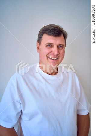 portrait of a middle-aged man on a white background 119993633