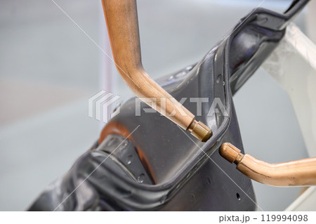 The automotive parts spot welding process by robotic system. The automotive parts spot welding process by robotic system. 119994098