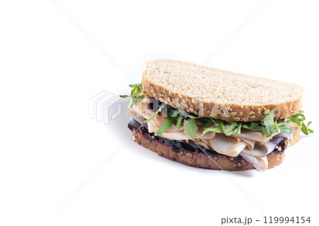 Turkey sandwich with cranberry sauce for Thanksgiving isolated on white background. Copy space Turkey sandwich with cranberry sauce for Thanksgiving isolated on white background. Copy space 119994154