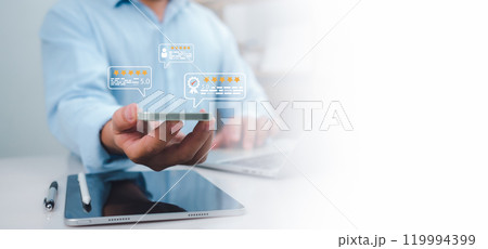 Businessman holding smartphone ask customers about their service experience and Rating for a satisfaction survey, Evaluation of product service quality by customers, Positive customer feedback. 119994399