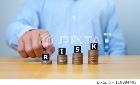 Risk management concept, RISK word print on black block on coins money with up arrow and percent for financial banking increase interest rate or investment dividend from, Investment Safety. Risk management concept, RISK word print on black block on coins money with up arrow and percent for financial banking increase interest rate or investment dividend from, Investment Safety. 119994405