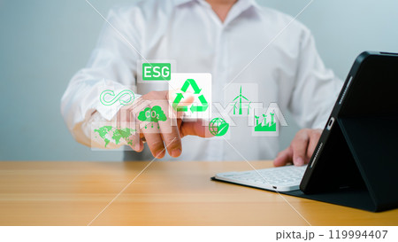Businessman analyze investment sustainability ESG icons. ESG environmental protection concept, Sustainable development, Climate change, Green energy recycle, Net zero and carbon neutral. 119994407