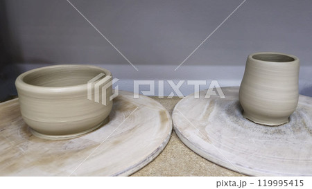 Handmade clay cups. In the process of preparation. Step by step guide. Handmade clay cups. In the process of preparation. Step by step guide. 119995415