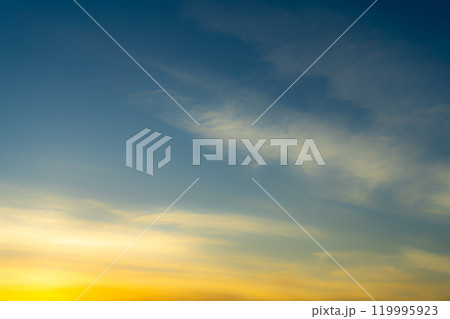 Blue and Golden Sky with Colorful Light Pink Cirrus Clouds at Sunset Wallpaper Texture Background Blue and Golden Sky with Colorful Light Pink Cirrus Clouds at Sunset Wallpaper Texture Background 119995923