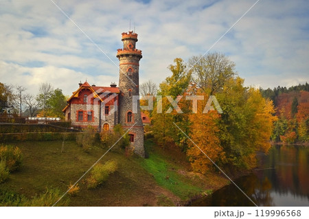 Beautiful old dam Les Kralovstvi - Czech Republic. Autumn background with colorful trees. Nature with landscape. Seasonal concept for fall. 119996568