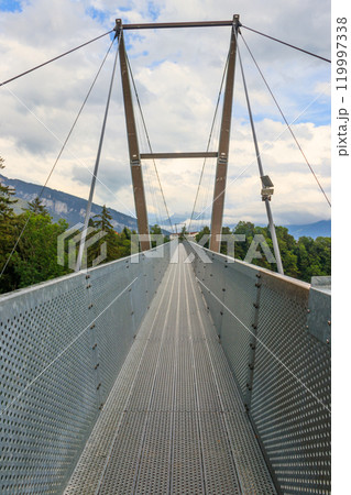 Suspension pedestrian panorama bridge over the Gummi gorge in Sigriswil, Switzerland 119997338