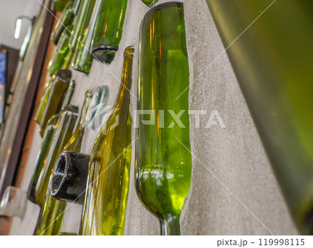 glass bottles in a wall detail glass bottles in a wall detail 119998115
