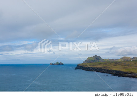 Vestmannaeyjar island beach day view, Iceland landscape. 119999013