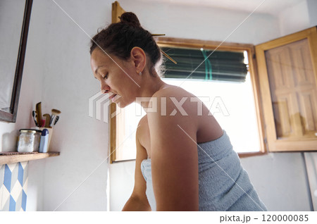 Serene moment of a woman enjoying a refreshing morning routine 120000085
