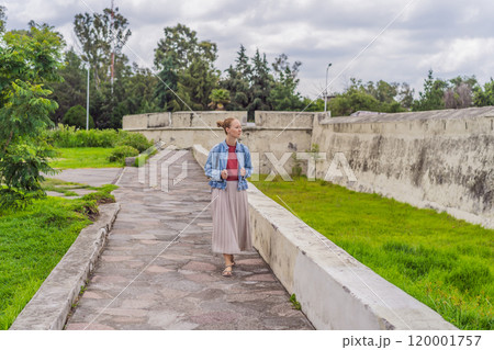 Female tourist exploring the Loreto Fort Museum in Puebla, Mexico. Cultural heritage, history, and travel exploration concept Female tourist exploring the Loreto Fort Museum in Puebla, Mexico. Cultural heritage, history, and travel exploration concept 120001757