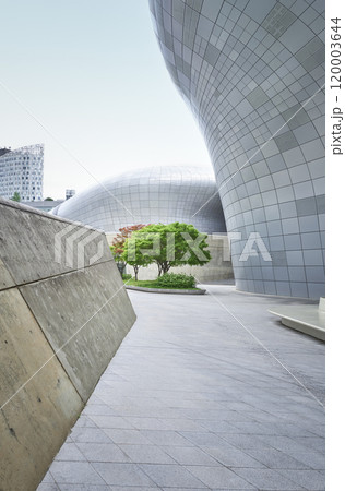 Modern architecture building exterior with trees growing outside Modern architecture building exterior with trees growing outside 120003644