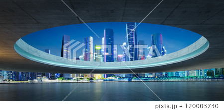 3D Futuristic cityscape view at night through circular frame 3D Futuristic cityscape view at night through circular frame 120003730