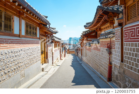 Narrow street leading up a hill with traditional korean houses in seoul Narrow street leading up a hill with traditional korean houses in seoul 120003755