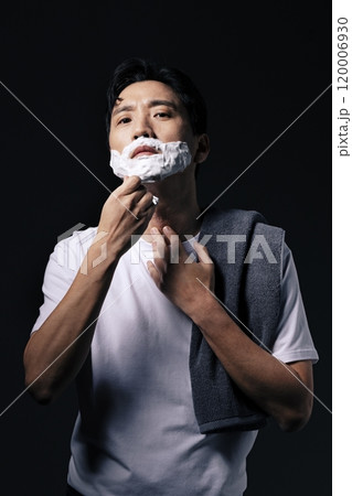 A middleaged man about to start shaving A middleaged man about to start shaving 120006930