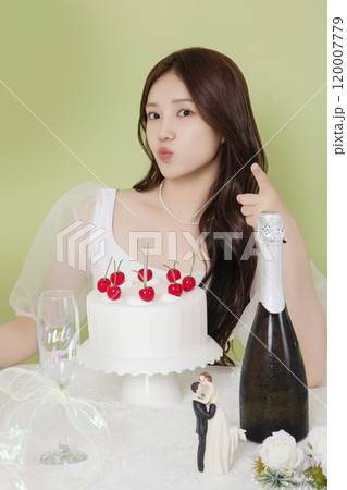 A woman in her 20s enjoying a bridal shower ahead of her wedding A woman in her 20s enjoying a bridal shower ahead of her wedding 120007779