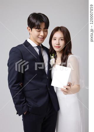 A beautiful couple in their 20s about to get married 120007859