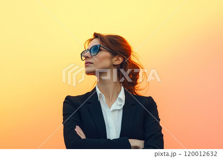 Confident businesswoman portrait against a vibrant yellow background, showcasing happiness and success. career growth, professional achievement, and empowerment in a modern work environment 120012632