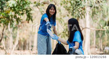 Group of volunteers, community members cleaning the nature from garbage and plastic waste to send it for recycling Group of volunteers, community members cleaning the nature from garbage and plastic waste to send it for recycling 120013288