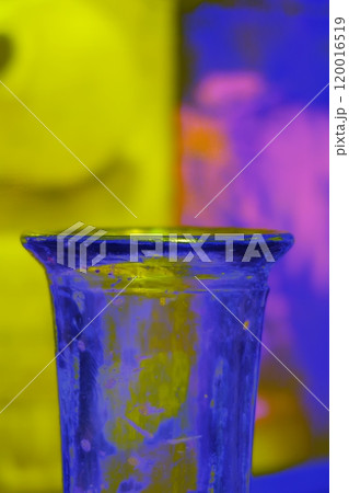The neck of a vintage glass bottle, modified color scheme, colorful background in pastel colors The neck of a vintage glass bottle, modified color scheme, colorful background in pastel colors 120016519