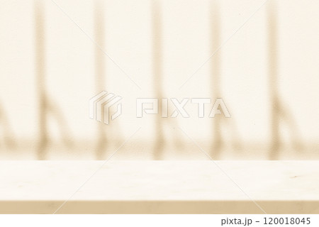 Marble Table with Stucco Wall with Fence Shadow Background Beige Tone, Suitable for Product Presentation Backdrop, Display, and Mock up. 120018045