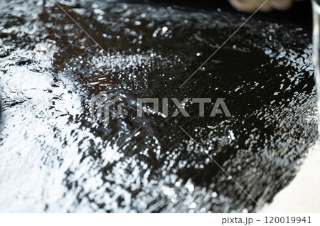 Brushed resin on a concrete surface. 120019941