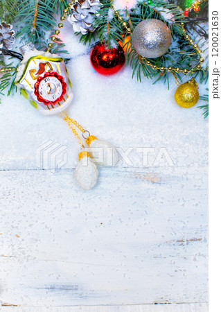 Christmas wooden background with snow branch. Top view with copy space for your text 120021630