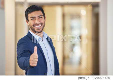 Happy businessman, portrait and vote with thumbs up for success, winning or review at office. Young man or employee with smile, like emoji or yes sign for thank you, positive attitude or feedback Happy businessman, portrait and vote with thumbs up for success, winning or review at office. Young man or employee with smile, like emoji or yes sign for thank you, positive attitude or feedback 120024480