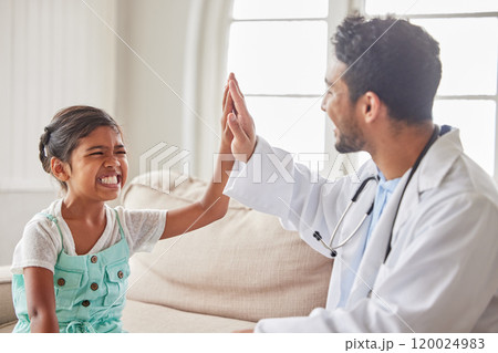 Doctor, girl and high five in home with smile excited and support for results with wellness on sofa. Pediatrician, man and child at family house, cheers and celebration for good news in Indonesia 120024983