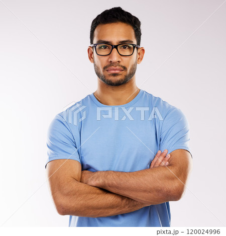 Crossed arms, glasses and portrait of man in studio with pride for web development career. Serious, IT and male programmer from Indonesia with confidence for vision or eyewear by white background. Crossed arms, glasses and portrait of man in studio with pride for web development career. Serious, IT and male programmer from Indonesia with confidence for vision or eyewear by white background. 120024996