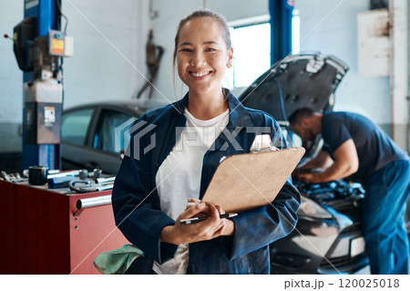 Woman, portrait and clipboard by car for mechanic maintenance, services and safety check at workshop. Asian engineer or worker with checklist, document and inspection at auto shop or transport repair Woman, portrait and clipboard by car for mechanic maintenance, services and safety check at workshop. Asian engineer or worker with checklist, document and inspection at auto shop or transport repair 120025018