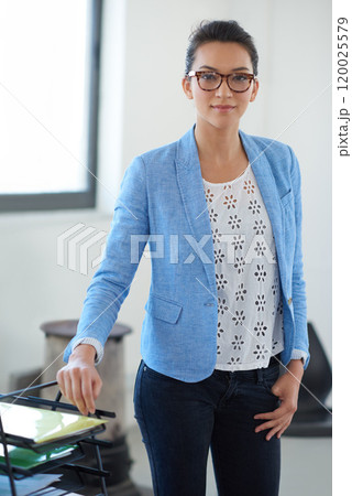 Office, professional and business woman in portrait for creative agency, career and job with confidence. Workspace, female graphic designer and ready for branding project, pride and smile for startup 120025579