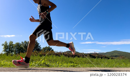 male runner running marathon race near of Borgo San Lorenzo 120028374
