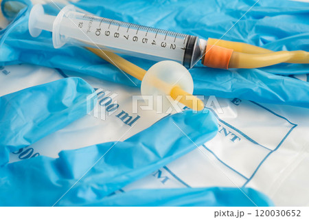 Foley catheter and urine drainage bag collect urine for disability or patient in hospital. Foley catheter and urine drainage bag collect urine for disability or patient in hospital. 120030652