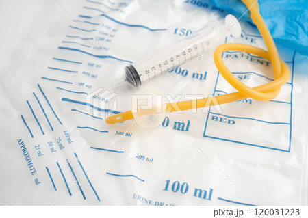 Foley catheter and urine drainage bag collect urine for disability or patient in hospital. 120031223
