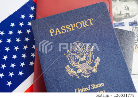US passport issued to citizen and national of the United States of America to travel in most countries outside with USA flag and dollar money. 120031779