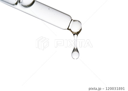 Dropper pipette with delicious serum with bubbles close-up. Dropper pipette with delicious serum with bubbles close-up. 120031891