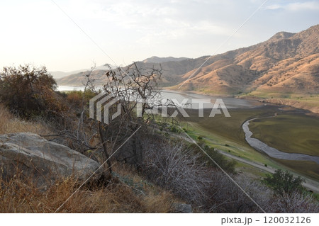 California hills background, view of mountains and river in the valley, natural landscape, wildlife at sunset, hills and plains 120032126