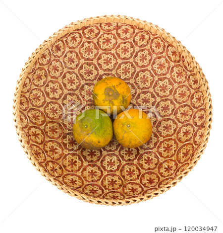 tangerine in wicker baskets isolated on white background tangerine in wicker baskets isolated on white background 120034947
