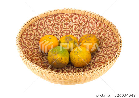 tangerine in wicker baskets isolated on white background tangerine in wicker baskets isolated on white background 120034948