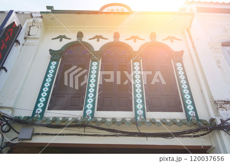 Detailed view of windows, doors and balconies of city buildings  120037656